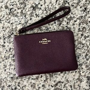 NWOT Coach Wristlet. Maroon/plum